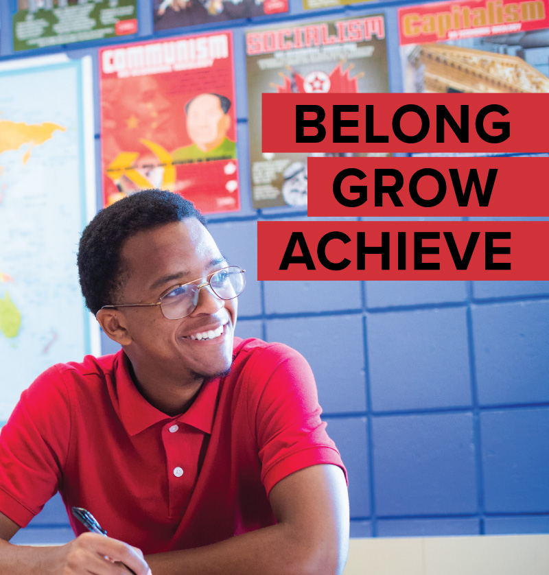 Photo of a smiling boy with the words Belong, Grow, and Achieve imposed over the photo