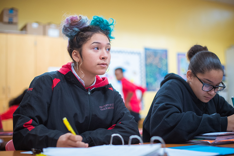 Photo of two girls working in class